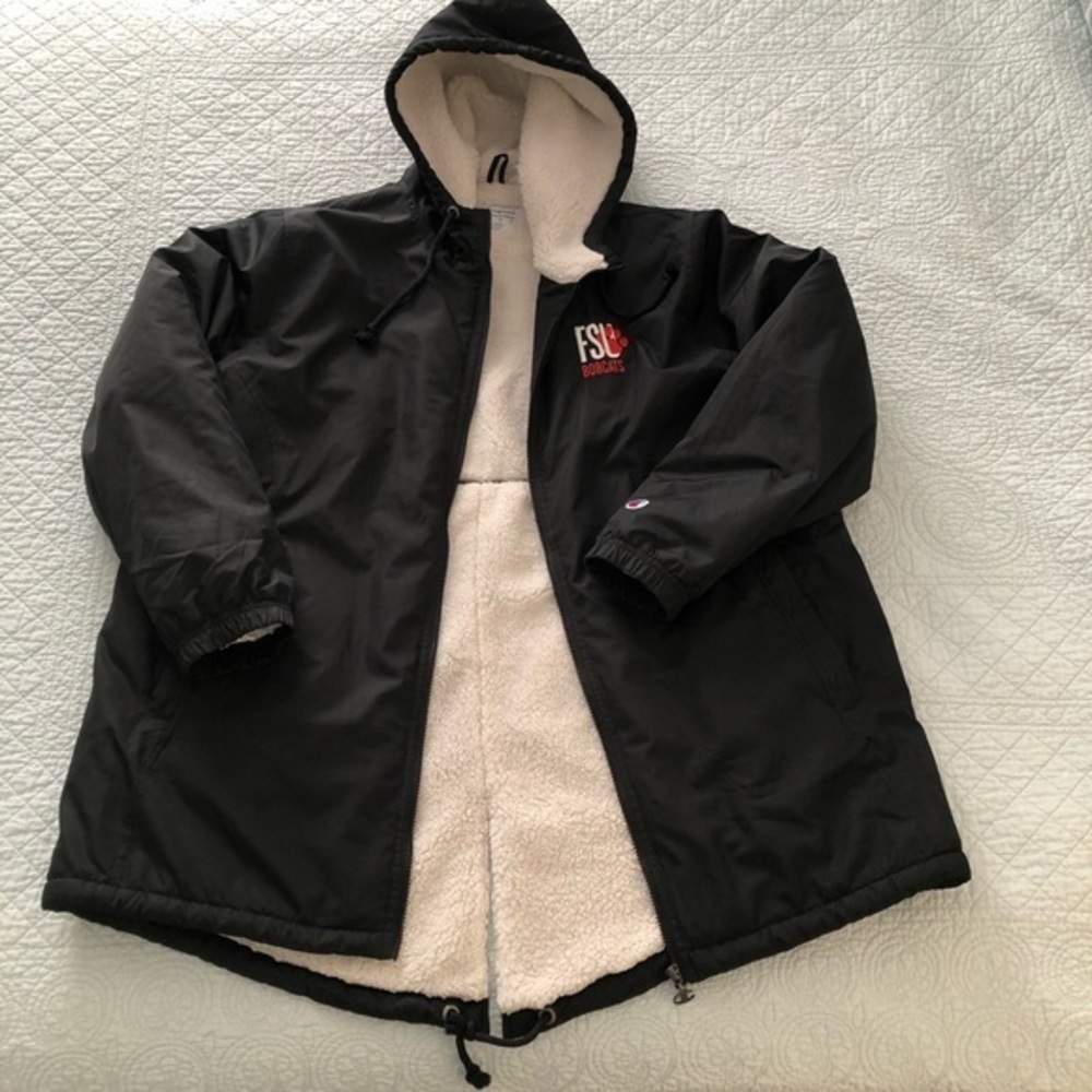 Champion hooded sherpa lined stadium jacket. Size women’s XL.